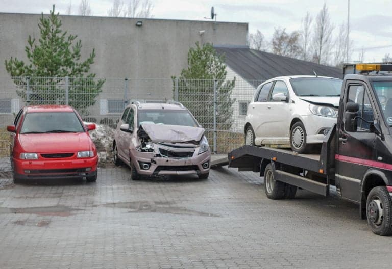 unloading broken car